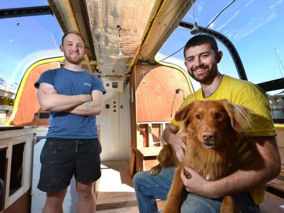 David Schnabel (left) and Guylee Simmonds with his dog Shackleton, a Nova Scotia duck tolling retriever. Photograph: Peter Cripps (15-5-19 (06)