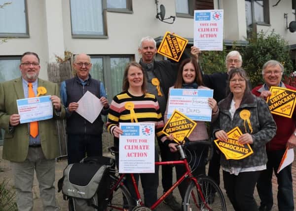Horsham Lib Dems outside Standings Court in April  to highlight how local action can make Horsham a better place to live at the same time as helping tackle climate change.