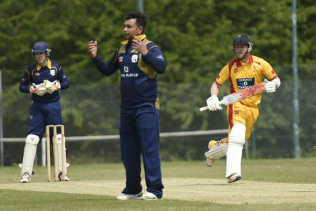 Thornely scores off the bowling of Middleton's Mahesh Rawat