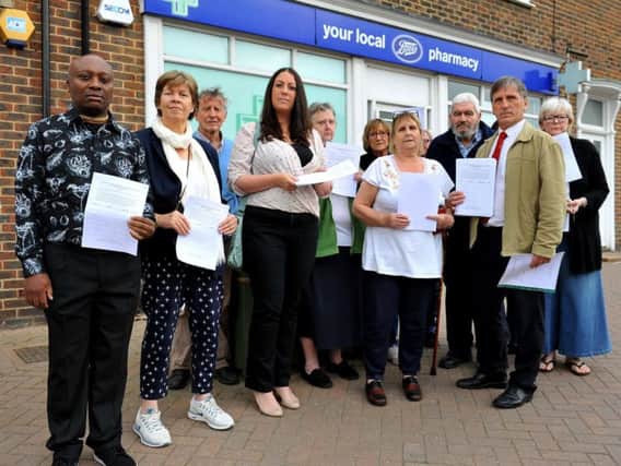 Upset residents and councillors outside Boots Pharmacy in America Lane, Haywards Heath. Photo by Steve Robards