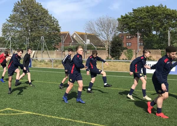 The Ark William Parker Academy year 10 boys' football team warming up ahead of its County Cup final