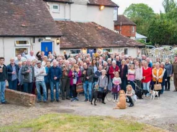 Villagers gather for the pop up pub at the Blue Bell. Picture contributed