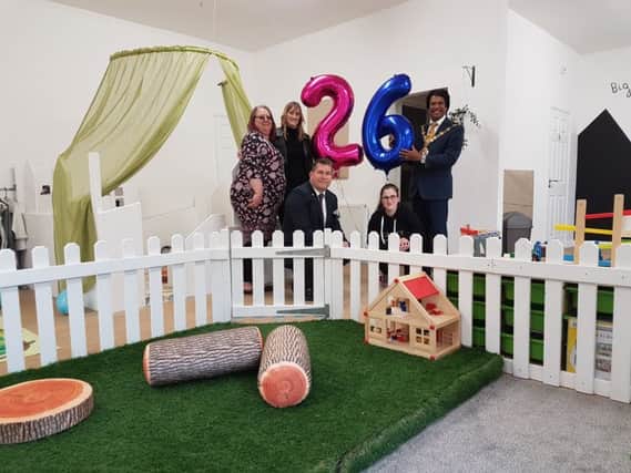 Katie from the Pebsham Community Committee, Kirsty Streets, co-owner of Bright Beginnings, Ian Woodward, NatWest relationship manager, Abul Azad, Mayor of Bexhill and Emily from the Pebsham Community Committee. The 26 signifies the new capacity of the nursery SUS-190524-133923001