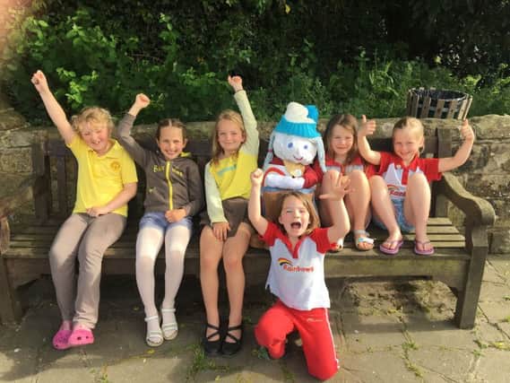 Members of the 1st Ardingly Brownies and Rainbows are delighted at the return of their stolen scarecrow SUS-190524-144202001