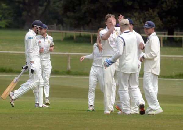 Hastings Priory celebrate a wicket during last weekend's win away to Chichester Priory Park. Picture courtesy Kate Shemilt