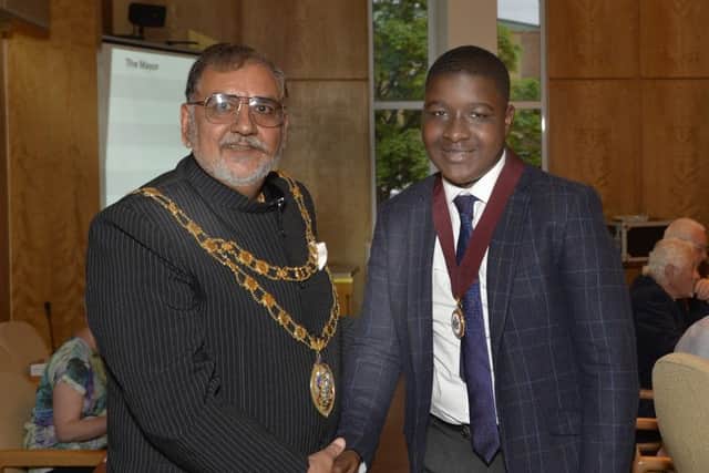 Raj Sharma with new youth mayor  Leon Mukazi