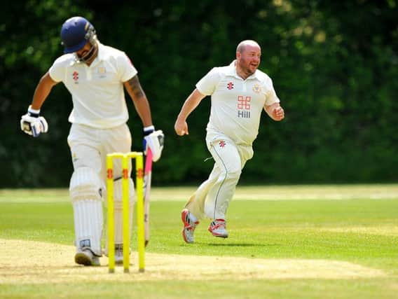 ifield's Graeme Dean celebrates a wicket against Chichester.
Picture by Steve Robards