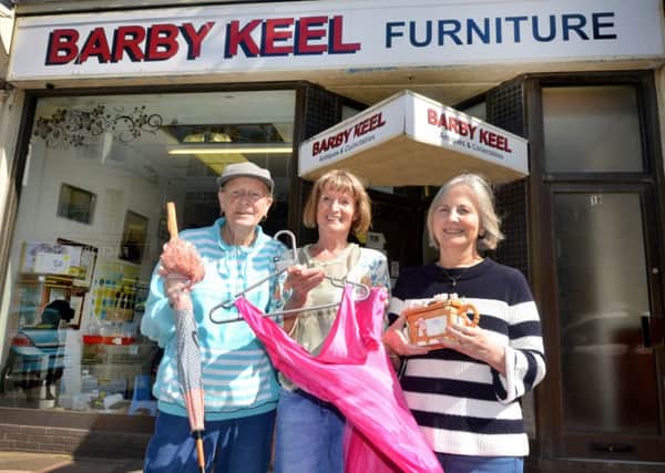 Shop manageress Susan Baxter (centre) with Joan Boylin (left) and Yvonne Ward (right) outside Barby Keel's charity shop in Bexhill. SUS-180613-104227001