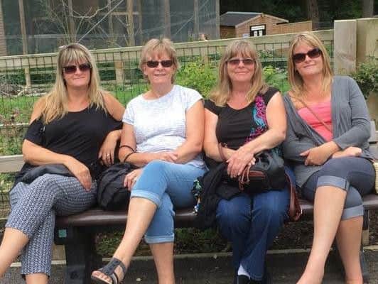 Mandy Finch (right) and her mum Lynn Osborne (second left) have been left 'disgusted' by vandalism in Aldwick