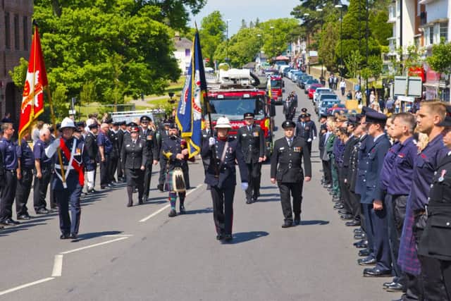 The route along South Road in Haywards Heath was lined by hundreds of fire personnel and members of the public. Photo by Eddie Howland