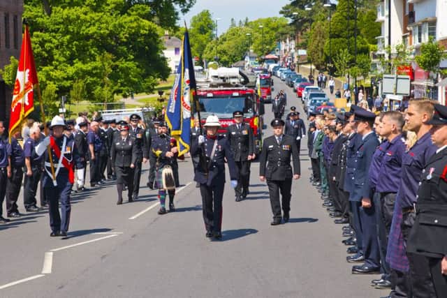 The route along South Road in Haywards Heath was lined by hundreds of fire personnel and members of the public. Photo by Eddie Howland