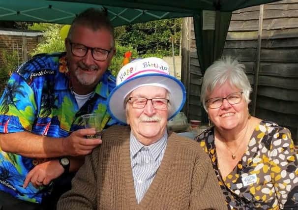 Ken at his birthday party with son Les Young and daughter-in-law Sue