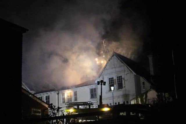 Firefighters tackle a fire at the former Mount Denys Care Home in The Ridge on May 18. Picture: Kevin Boorman