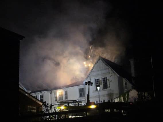 Firefighters tackle a fire at the former Mount Denys Care Home in The Ridge on May 18. Picture: Kevin Boorman