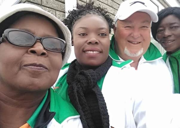 Charles Wright and the Zambia women's triples bowls team which has qualified for the 2020 World Championships