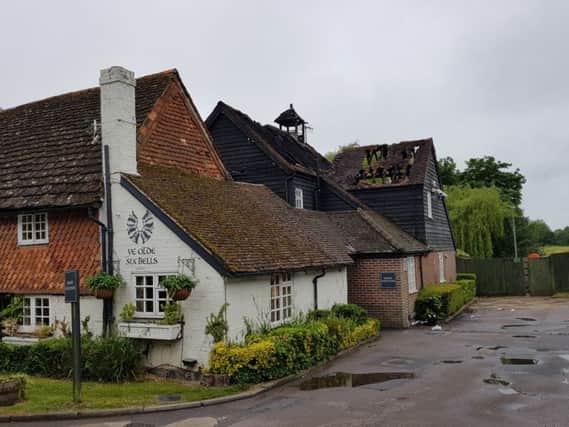 Aftermath of the fire at Ye Olde Six Bells in Horley SUS-190530-100722001