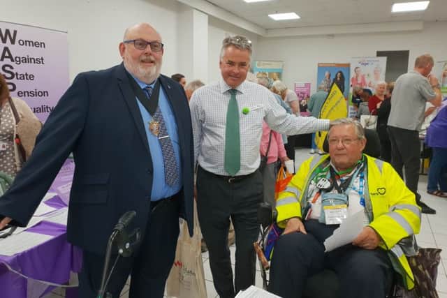 Martin Osment, Freedom Powerchairs chairman, with East Worthing MP Tim Loughton and Paul Baker