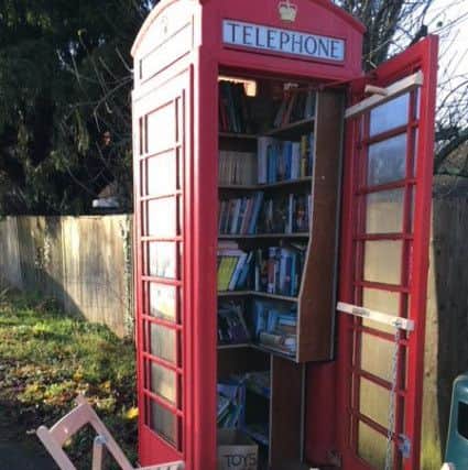 Brook Street Library, Ansty and Staplefield Parish Council's winning entry, has shelves of books and two folding seats