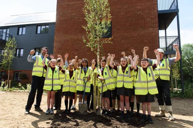 Pupils at Handcross Primary School have made their mark on history by planting trees in the village SUS-190306-115037001