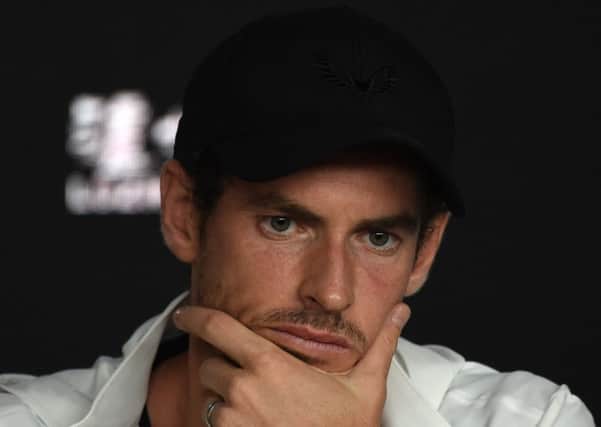 Britain's Andy Murray addresses media representatives at a press conference after defeat in his first round men's singles match against Spain's Roberto Bautista Agut on day one of the Australian Open tennis tournament in Melbourne early January 15, 2019. (Photo by Greg Wood / AFP) / -- IMAGE RESTRICTED TO EDITORIAL USE - STRICTLY NO COMMERCIAL USE --        (Photo credit should read GREG WOOD/AFP/Getty Images) SUS-190406-133408002