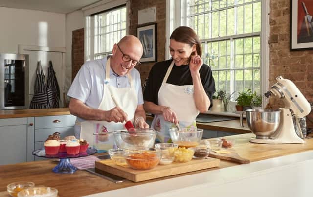 Actor Suranne Jones makes cupcakes with Paul Hoskins for the Alzheimer's Society Cupcake Day on June 13 SUS-190406-154829001