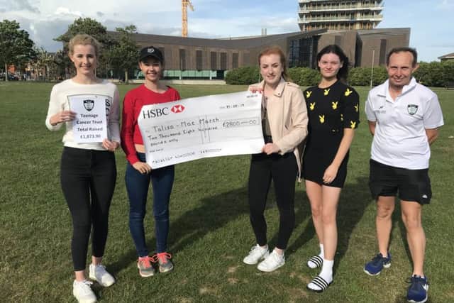 The cheque presentation for Talisa-Mae Marsh at Beach House Grounds. Pictured: Petrina Marsh, Talisa-Mae Marsh, Ellie Ransom, Katie OHara and Chris Luesley