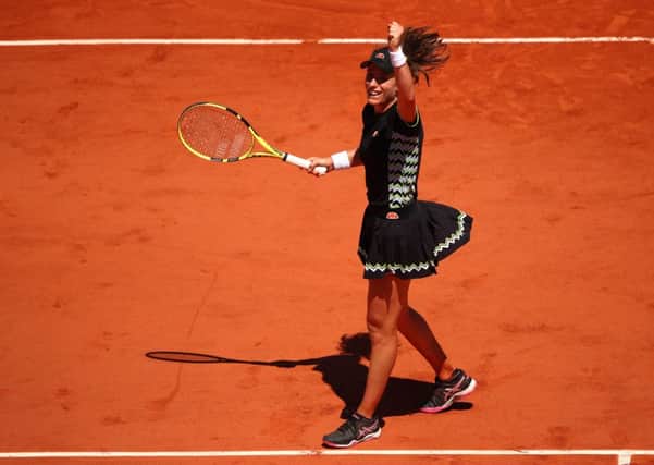 PARIS, FRANCE - JUNE 02: Johanna Konta of Great Britain celebrates victory during her ladies singles fourth round match against Donna Vekic of Croatia during Day eight of the 2019 French Open at Roland Garros on June 02, 2019 in Paris, France. (Photo by Clive Brunskill/Getty Images) SUS-190306-110259002