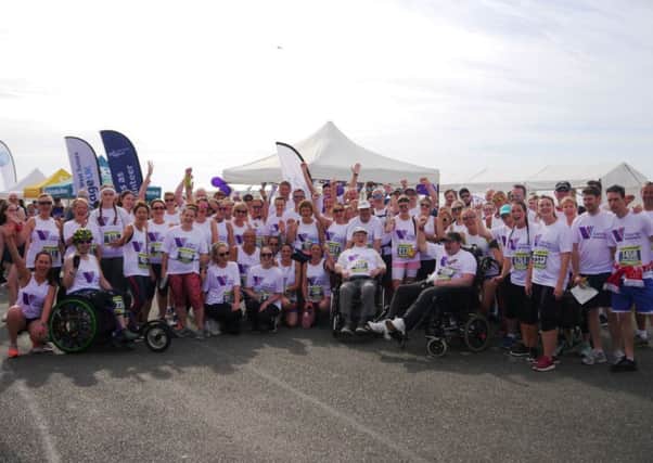 Among the Care for Veterans team for Worthing 10k were supporters in wheelchairs, Mic Riddy, who was self-propelling, and residents Tony Walker and Steve Boylan