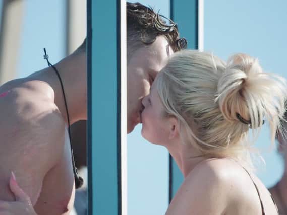 Curtis and Amy share a kiss. Picture: ITV