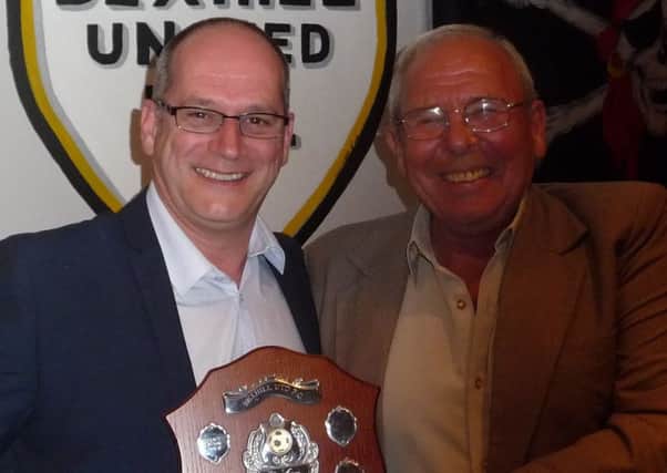 New Bexhill United chairman Graham Cox (left) with his predecessor Bill Harrison. Picture courtesy Mark Killy