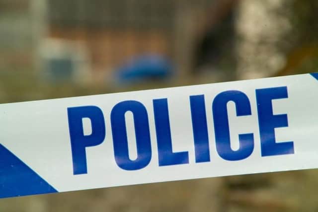 Crawley police are investigating the rape of a woman on a path in Pound Hill