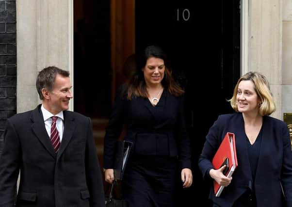 Jeremy Hunt and Amber Rudd outside Downing Street  (Photo by Leon Neal/Getty Images)