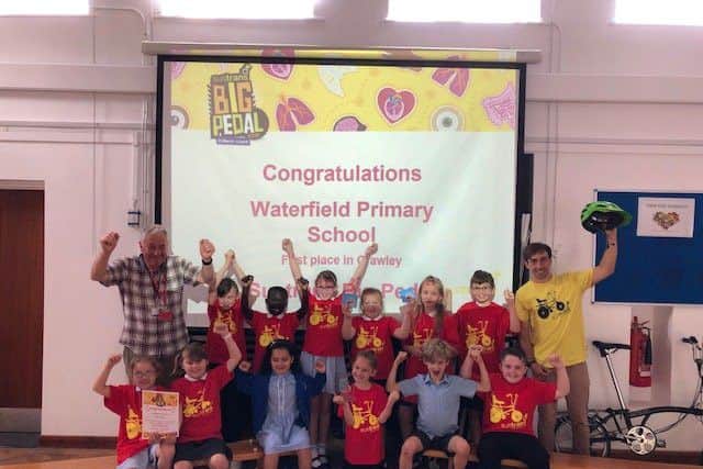 Pupils at Waterfield Primary School celebrate the award