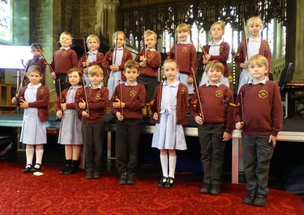 Pupils from Crowhurst SCE Primary School play at a lunchtime concert at  Holy Trinity Hastings Church SUS-190619-102913001
