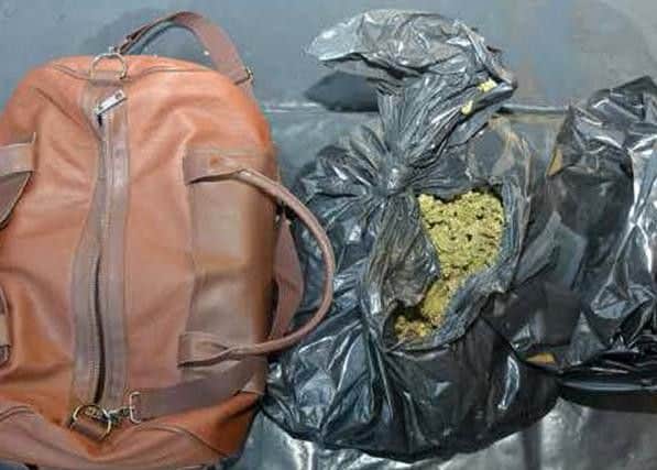 A holdall and bin bags of cannabis