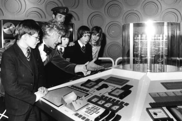 "And heres the new cross trainer." Not really - its Jon Pertwee as Dr Who, showing his TARDIS to a group of school children in 1972. (Photo by Mike Lawn/Fox Photos/Getty Images) SUS-190614-164906001