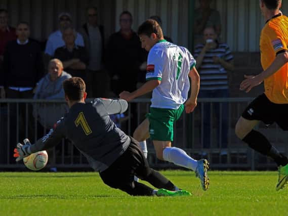 Stu Green in Rocks action against Merstham in 2015 / Picture by Chris Hatton