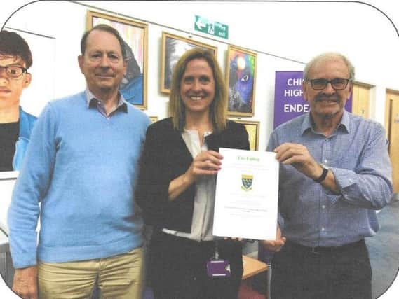 From left: Former Chichester High School for Boys headteacher, John Child; Current headteacher Joanne McKeown; and Colin Snook.

Picture contributed.