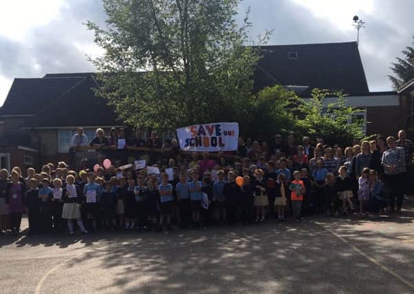 Pupils, parents and staff at Broad Oak Primary School, calling for the school to be saved