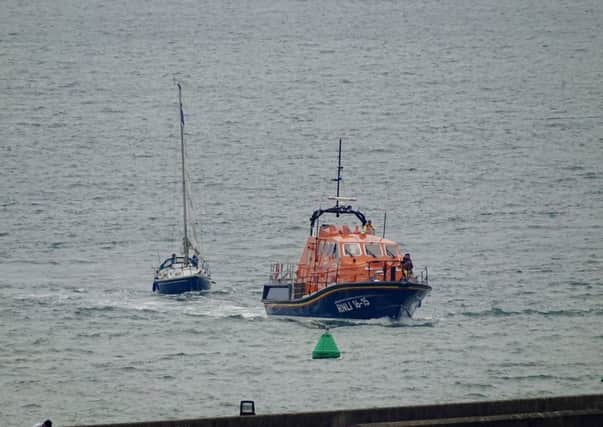 The Shoreham all weather lifeboat towing a broken down yacht on
Sunday. Credit Oliver Button.