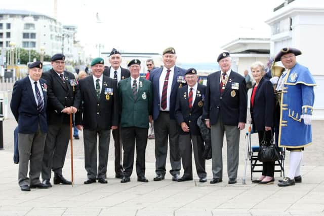 Military veterans arrive by taxi to enjoy a day out in Worthing