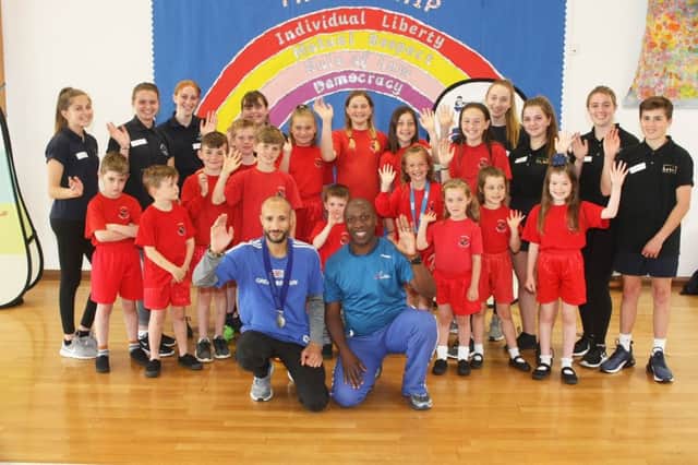 DM1962910a.jpg. GB Commonwealth Games gold medallist Steve Frew, left, visiting Lyminster Primary School with event leader Adrian Patrick, a Commonwealth Games Gold medallist. Photo by  Derek Martin Photography. SUS-190618-171437008
