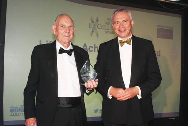 DM1963213a.jpg. Observer Business Excellence Awards 2019 at Hilton Avisford Park, Arundel. Lifetime Achievement award, Derek Howell, Tawney Nurseries presented by Gary Shipton, Editorial Director and Editor, Sussex Newspapers. Photo by Derek Martin Photography.