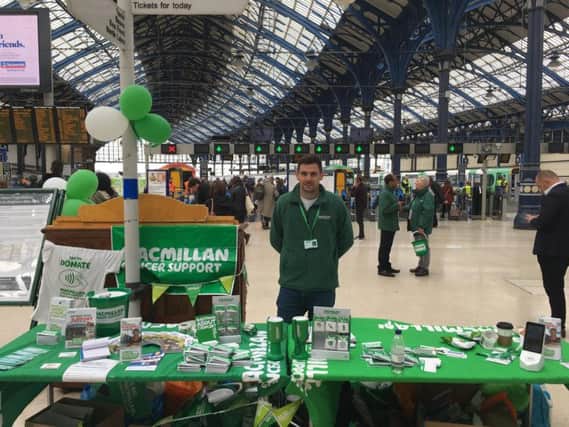Josh Munns, who was running a stall for Macmillan in Brighton station