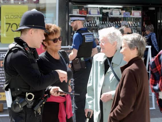 Arun and Chichester prevention team acting inspector Danny West speaking to the public in Bognor Regis town centre last month. Photo: Kate Shemilt