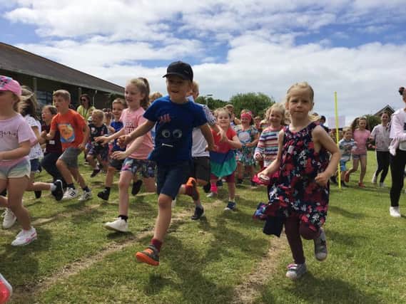 Race for Life at Durrington Infant and Junior Federated Schools, including a competition to find the most colourful class