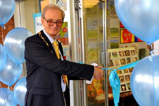 District council chairman Colin Trumble officially opening the pop up shop in Burgess Hill. Photo by Steve Robards