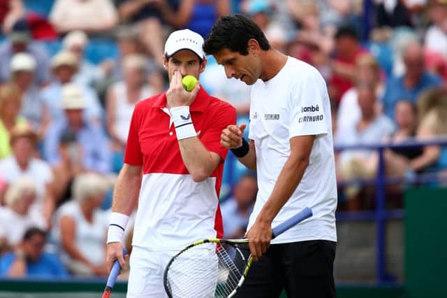 EASTBOURNE, ENGLAND - JUNE 25: Andy Murray of Great Britain and Marcelo Melo of Brazil in action during their mens doubles match against Columbian pair Juan Sebastian Cabal and Robert Farah during day two of the Nature Valley International at Devonshire Park on June 25, 2019 in Eastbourne, United Kingdom. (Photo by Charlie Crowhurst/Getty Images for LTA) SUS-190625-220810002