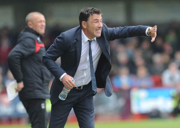 Dean Saunders during his time as manager of Crawley Town. Picture by Jon Rigby