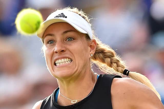 Germany's Angelique Kerber returns against Australia's Samantha Stosur during their women's second round match at the WTA Nature valley International tennis tournament in Eastbourne, southern England on June 25, 2019. (Photo by Glyn KIRK / AFP)        (Photo credit should read GLYN KIRK/AFP/Getty Images) SUS-190626-172229002
